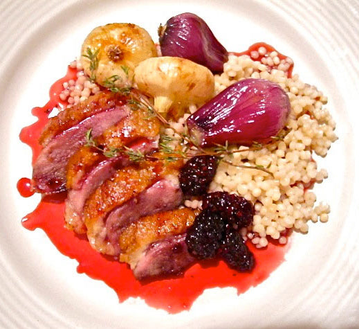 Crispy Duck with Blackberry Gastrique, Roasted Pearl Onions, and Israeli Cous-Cous