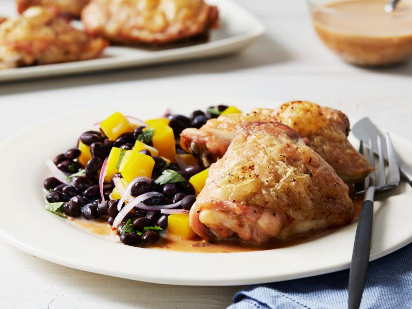 Crispy Roasted Chicken Thighs with Chipotle-Coconut Sauce and Black Bean-Mango Salad