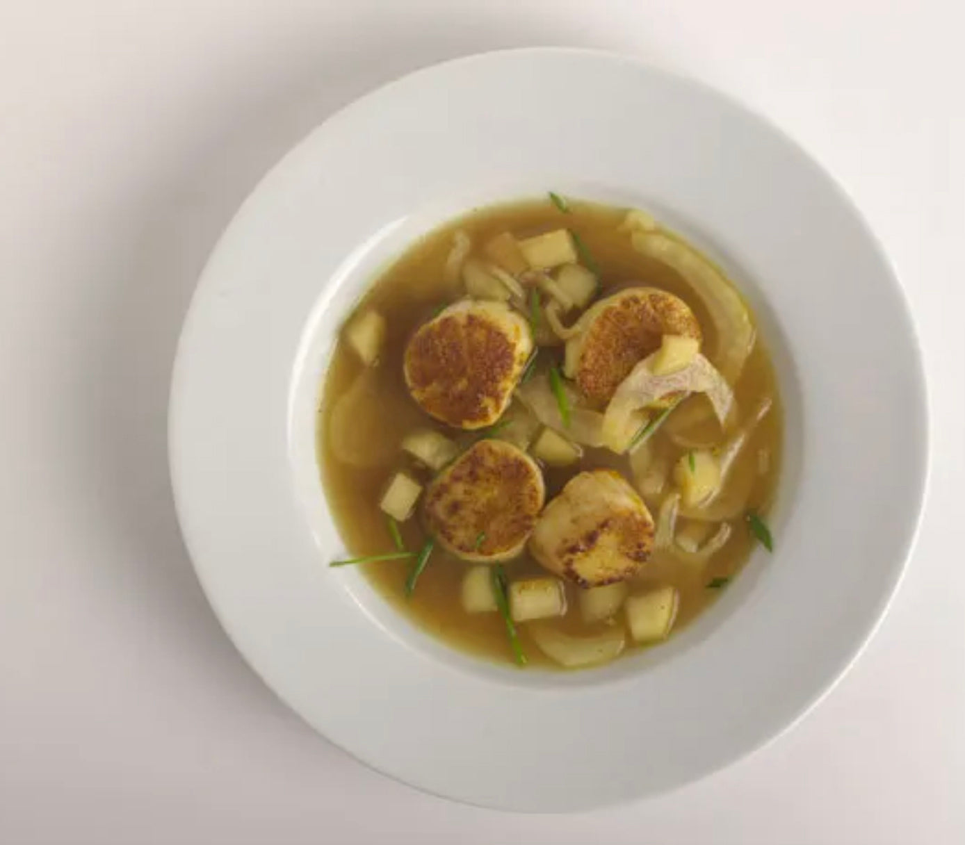 Curry-Dusted Scallops with Fennel-Apple Broth