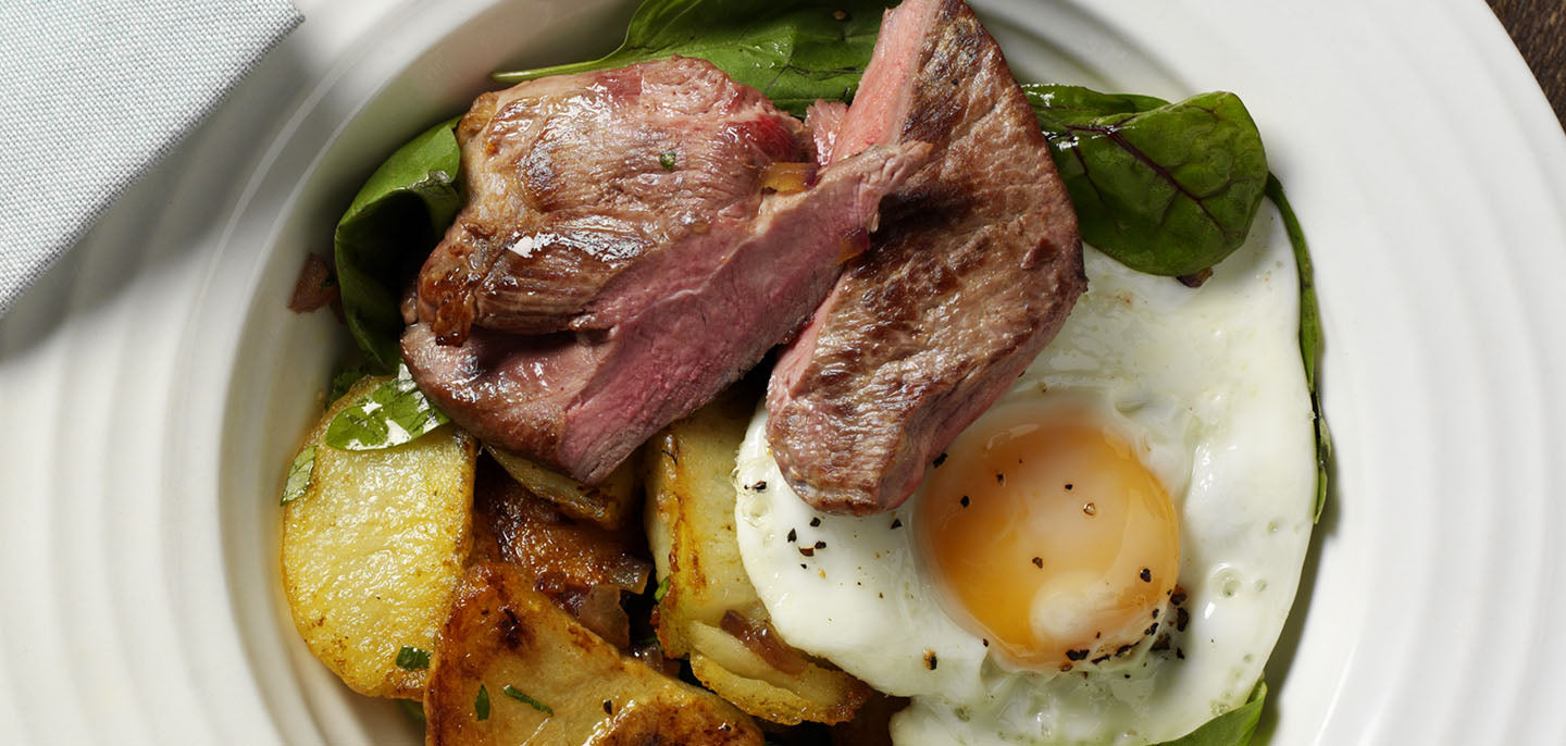 Duck® Steak with Fried Duck Egg, Roast Potatoes and Spinach