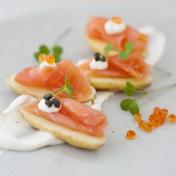 Huon Premium Cold Smoked Salmon on Kipfler Potatoes with Crème Fraiche, Capers and Salmon Caviar