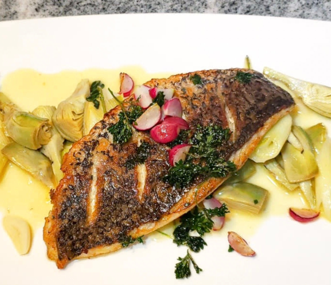 Pan Seared Barramundi with Artichokes, Leeks and Lemon Butter