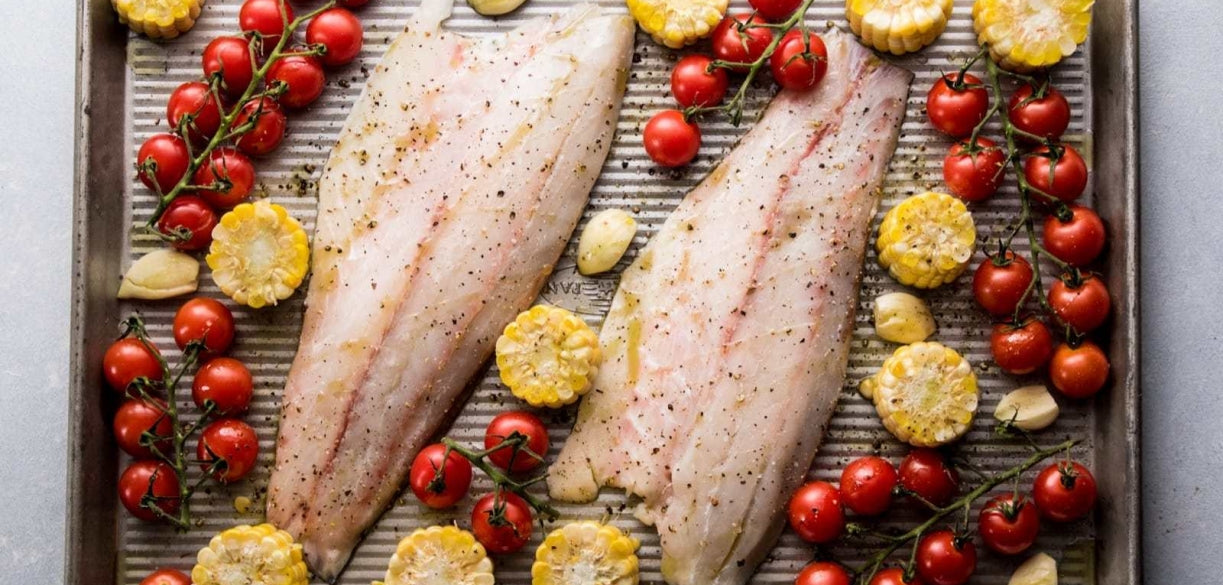 Sheet Pan Roasted Barramundi with Corn, Tomatoes, and Lime Butter