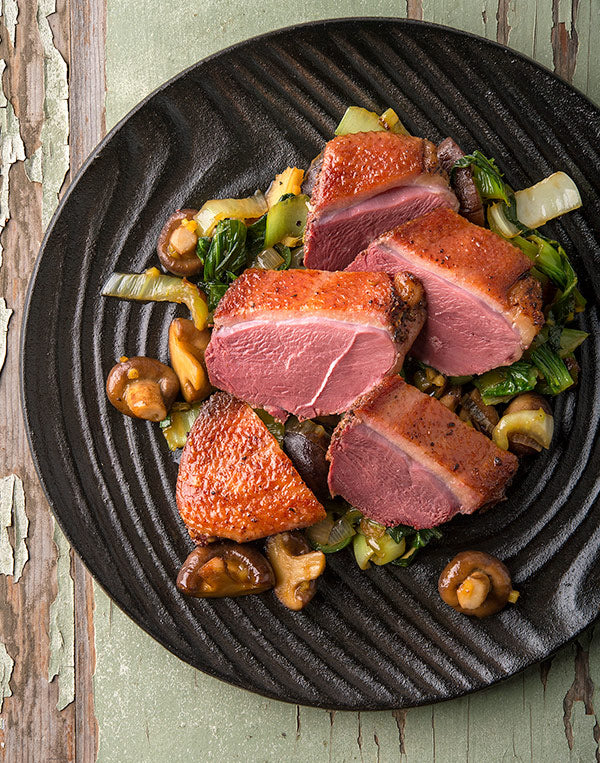 Tea smoked duck with aromatic tea leaf smoke